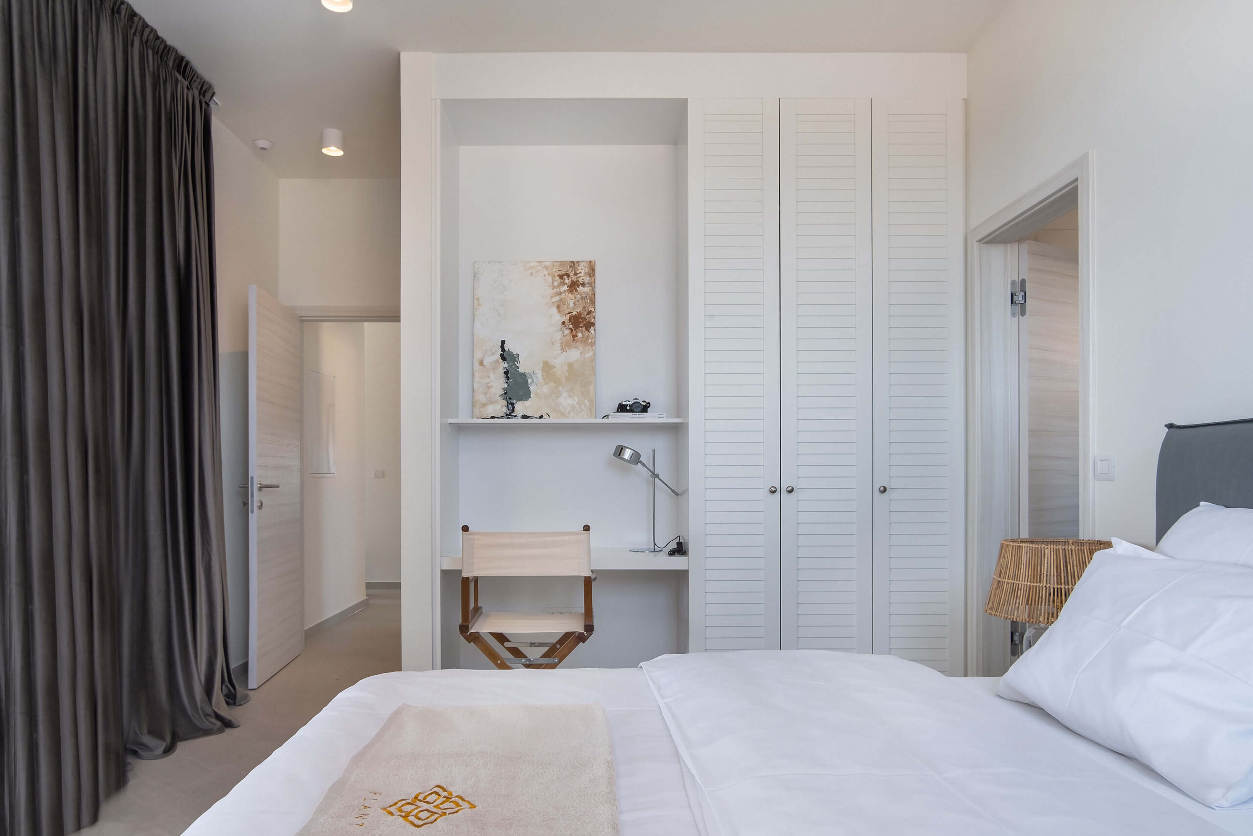Cozy luxurious bedroom with cabinet